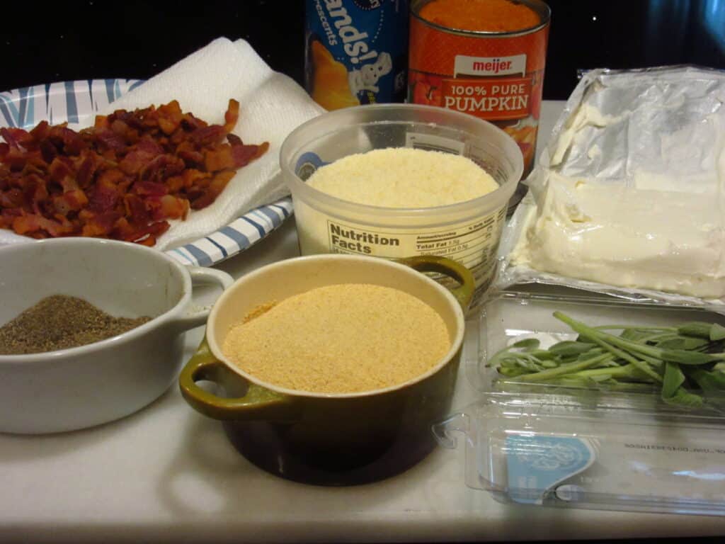 The ingredients for making Pumpkin Sage Pinwheel Appetizers.