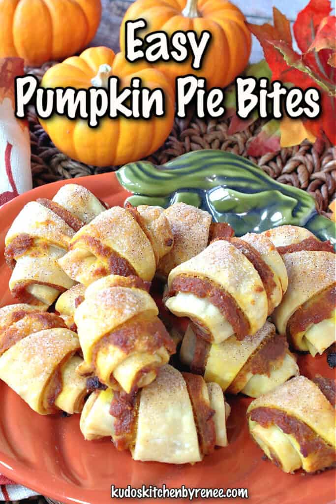 A vertical closeup image of Pumpkin Pie Bites with cinnamon sugar on a pumpkin plate with a title text overlay graphic in white and black.