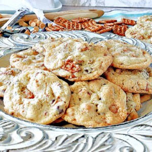 A pretty platter filled with Take 5 Cookies with pretzels in the background.