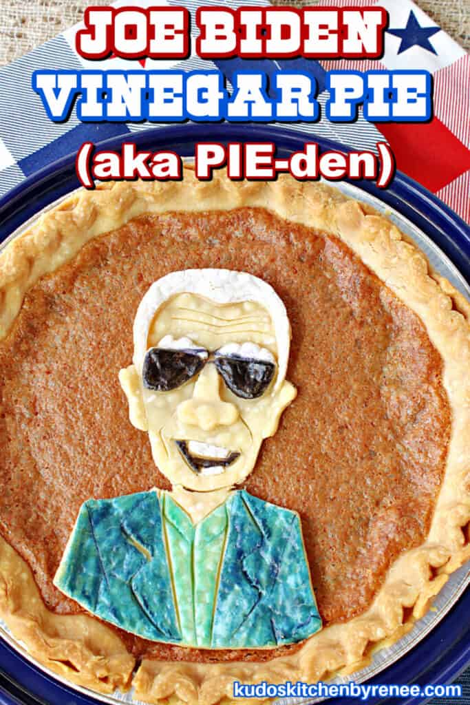 An overhead vertical closeup of a vinegar pie with a Joe Biden character painted pie crust on top.