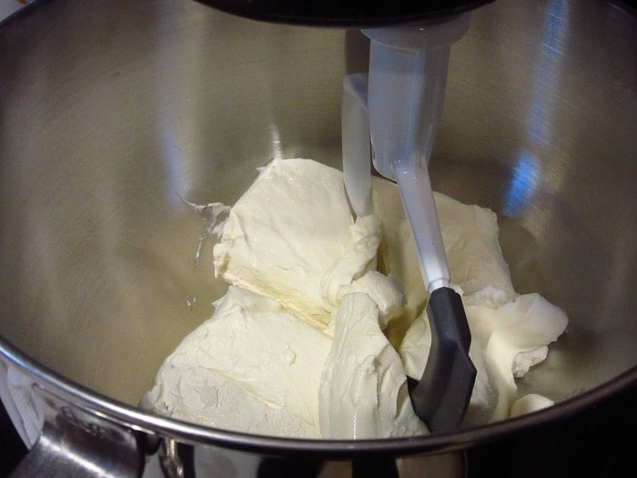 Cream cheese in a stand mixer.