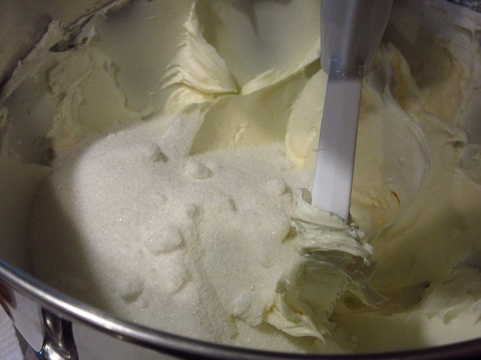 Cream cheese and sugar in a stand mixer.