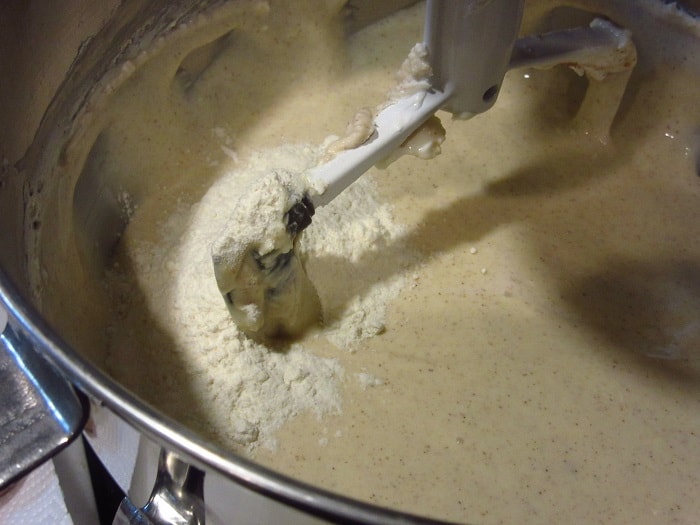 Flour in a stand mixer with cheesecake filling.