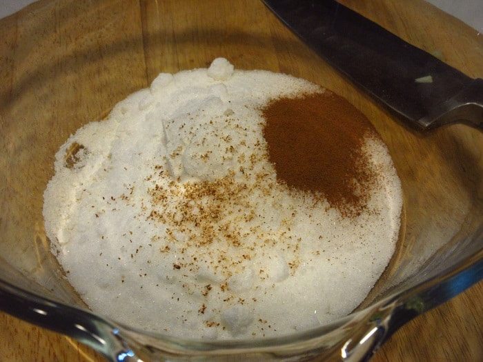 Flour and spices in a glass bowl.