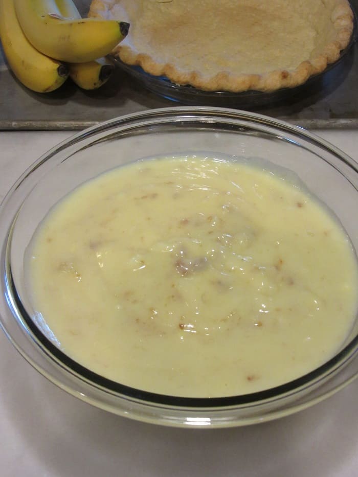 The custard for a banana cream pie in a glass bowl.