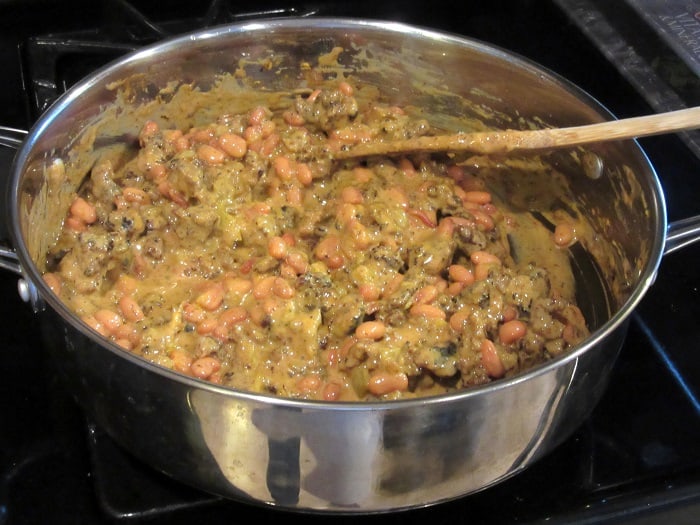 Cheesy Sausage Bean dip in a skillet.