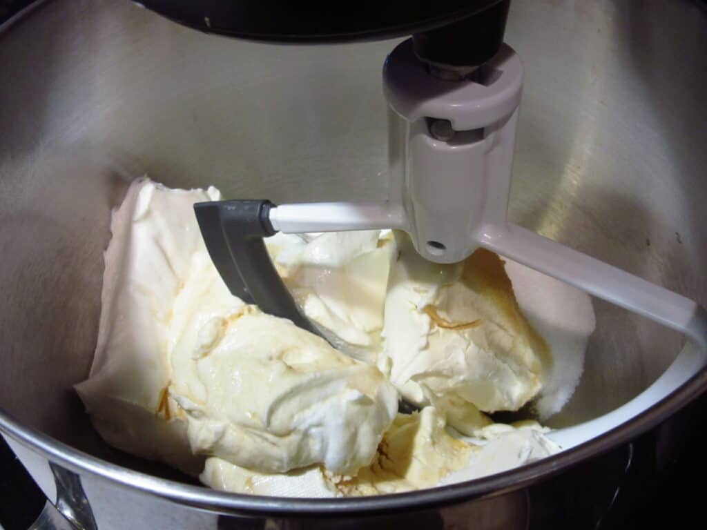 A stand mixer making cheesecake.