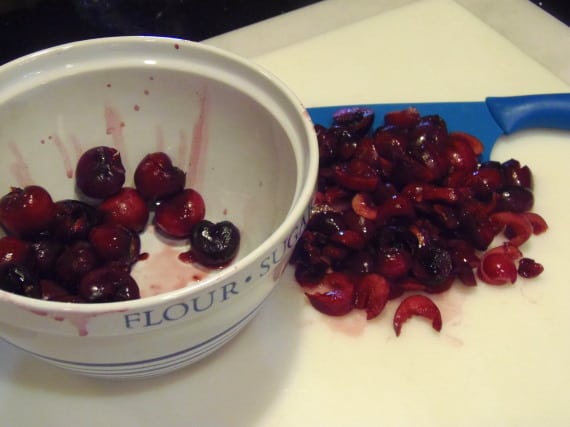 pitted cherries in a bowl.