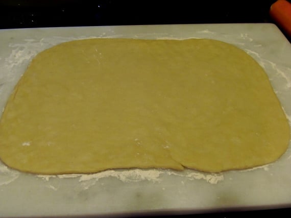 Dough rolled out on the counter.