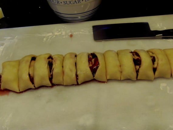 Sliced dough for Cherry Sweet Rolls.