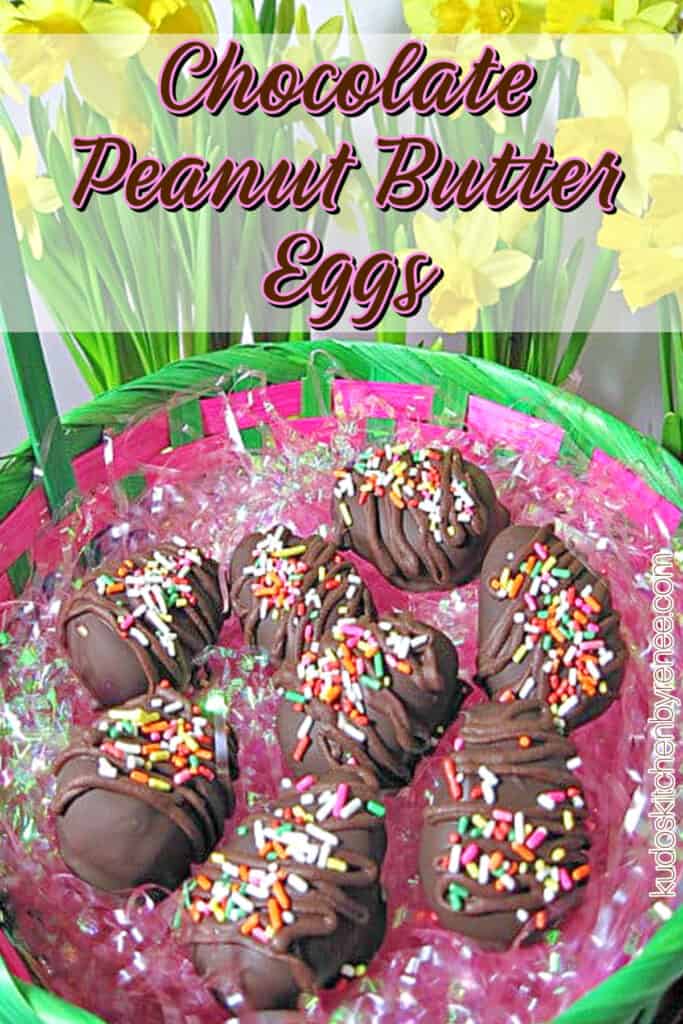 A vertical closeup of Chocolate Peanut Butter Eggs in an Easter basket with pink grass along with a title text overlay graphic on top of the image.