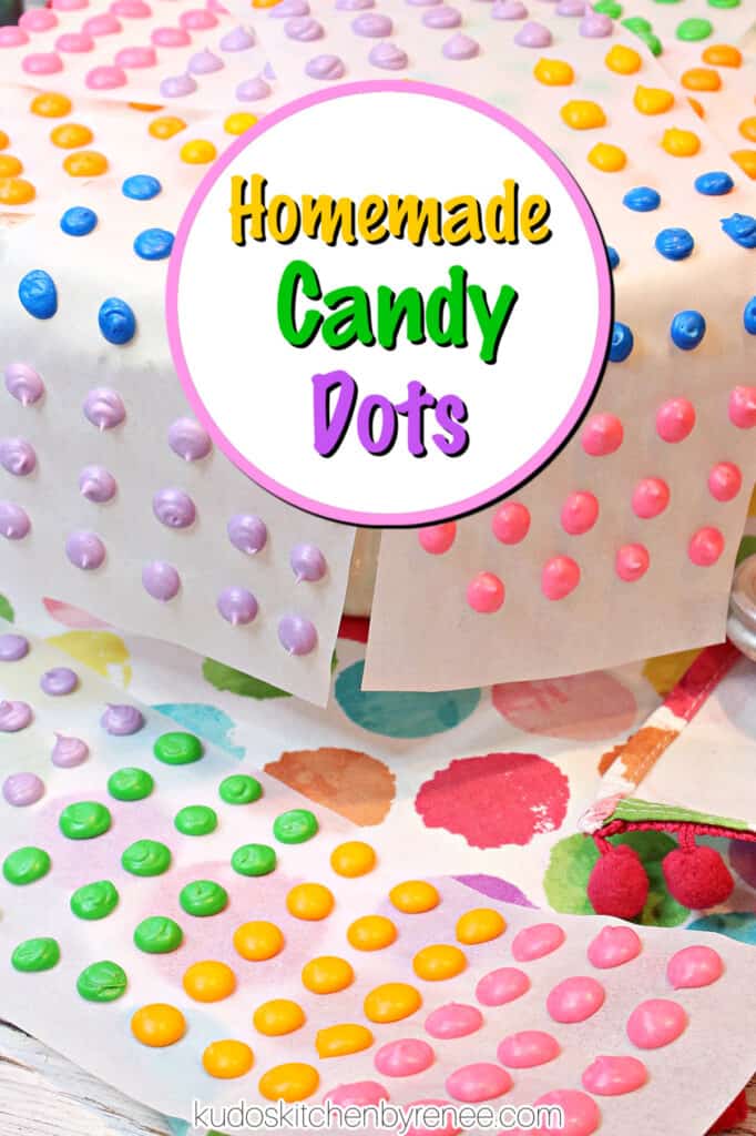 A vertical closeup of colorful retro Homemade Candy Dots on white strips of paper with a colorful title text overlay circle.