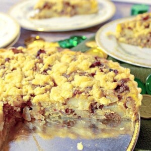 An Irish Cheese and Potato Tart with a slice taken out.