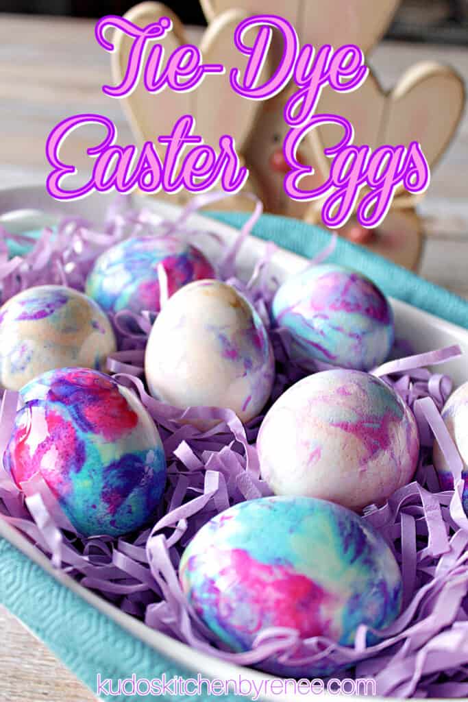 A vertical closeup photo along with a title text overlay graphic for Tie-Dye Easter Eggs with pretty marbled colors.