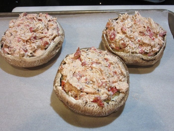 Stuffed Portobello mushrooms before baking.