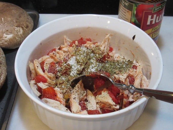 Ingredients for making Chicken Parmesan Stuffed Portobellos in a bowl.