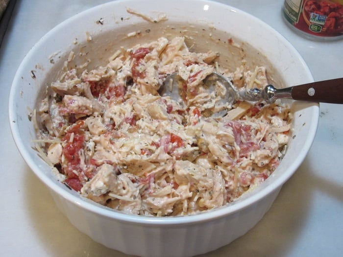 A chicken mixture ready to be stuffed into portobello mushrooms. 