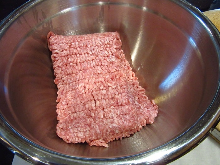 Ground pork in a bowl.