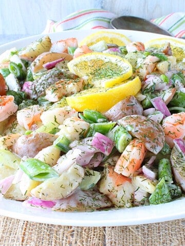 A colorful bowl of Shrimp Veggie Salad with Dill.