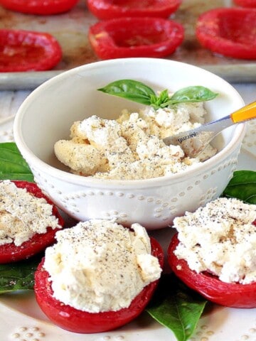 Homemade Ricotta Cheese stuffed into Roma tomatoes.