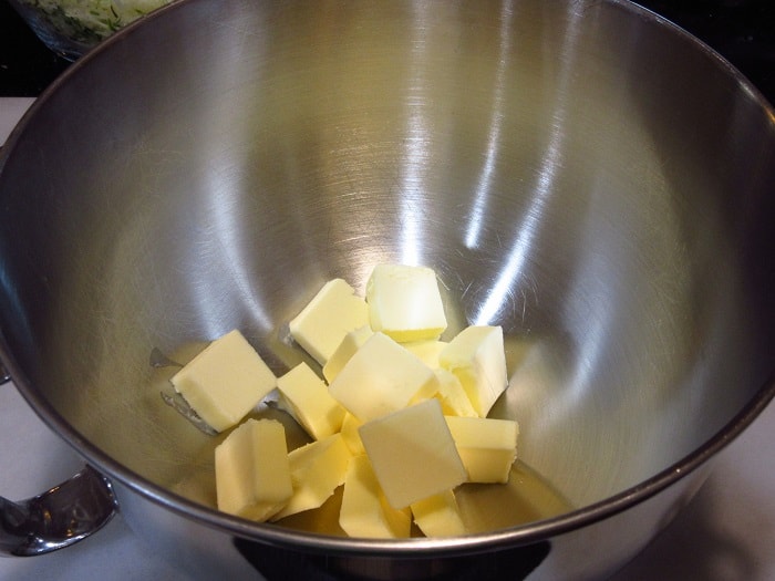 Cut up butter in a bowl.