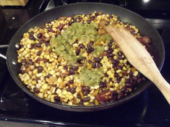 Corn and black beans in a skillet.
