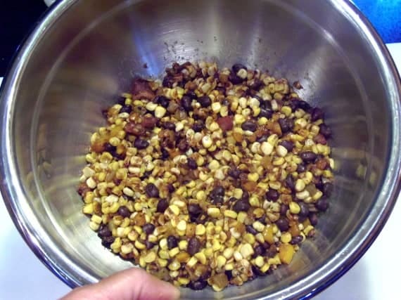 Corn and black beans in a bowl.