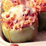 A Spaghetti Stuffed Bell Pepper topped with melted cheese.