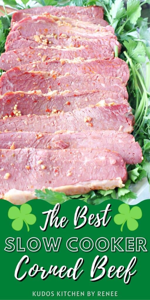 A vertical closeup image of a plate filled with sliced Slow Cooker Corned Beef along with fresh parsley and a title text graphic on the bottom of the image.