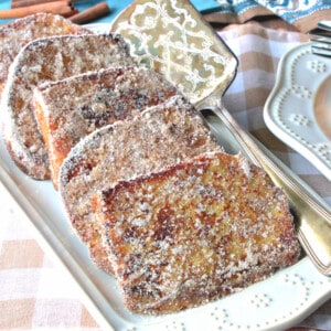 A plate of Cinnamon Sugar Frensh Toast with a fancy server.