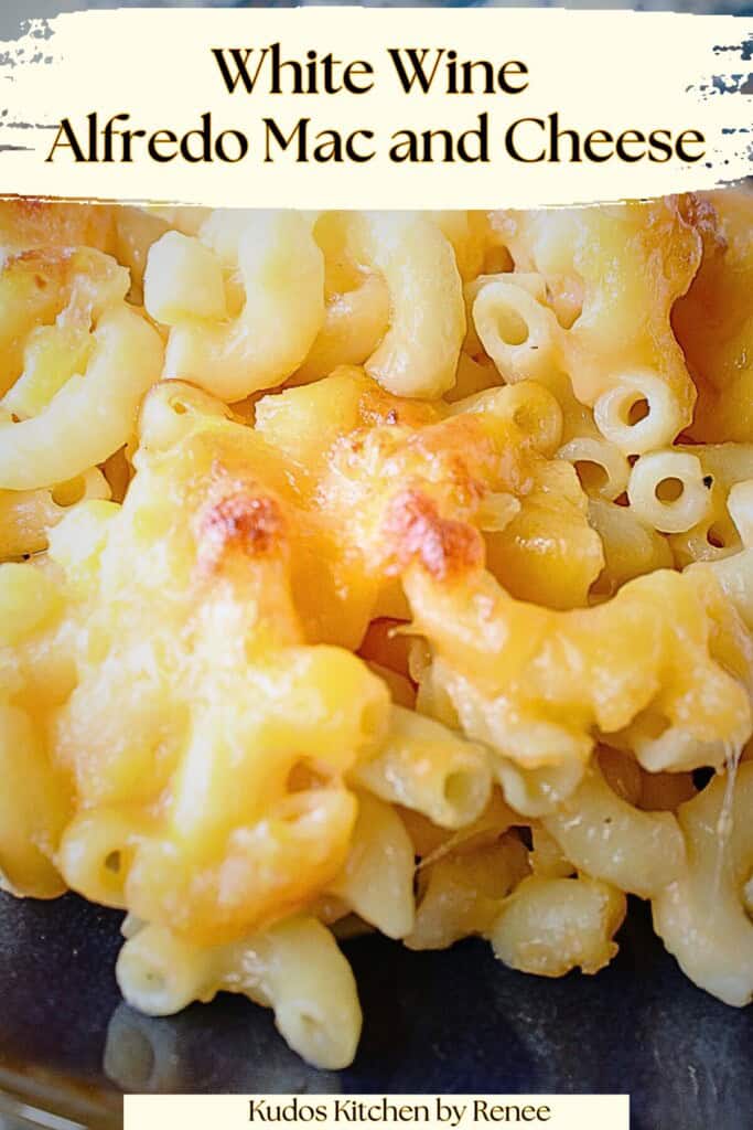 A close up of Alfredo Mac and Cheese with white wine Pinterest pin.