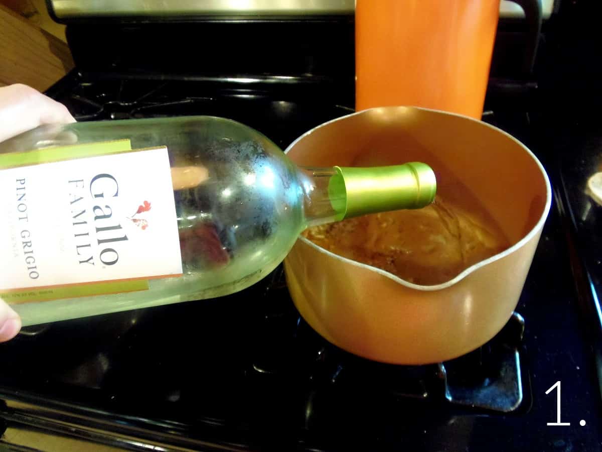 Wine being added to a saucepan.