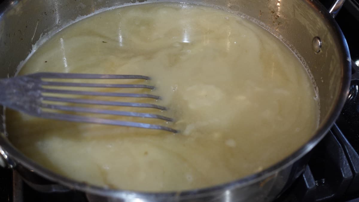 A cream sauce being made for Turkey tetrazzini.