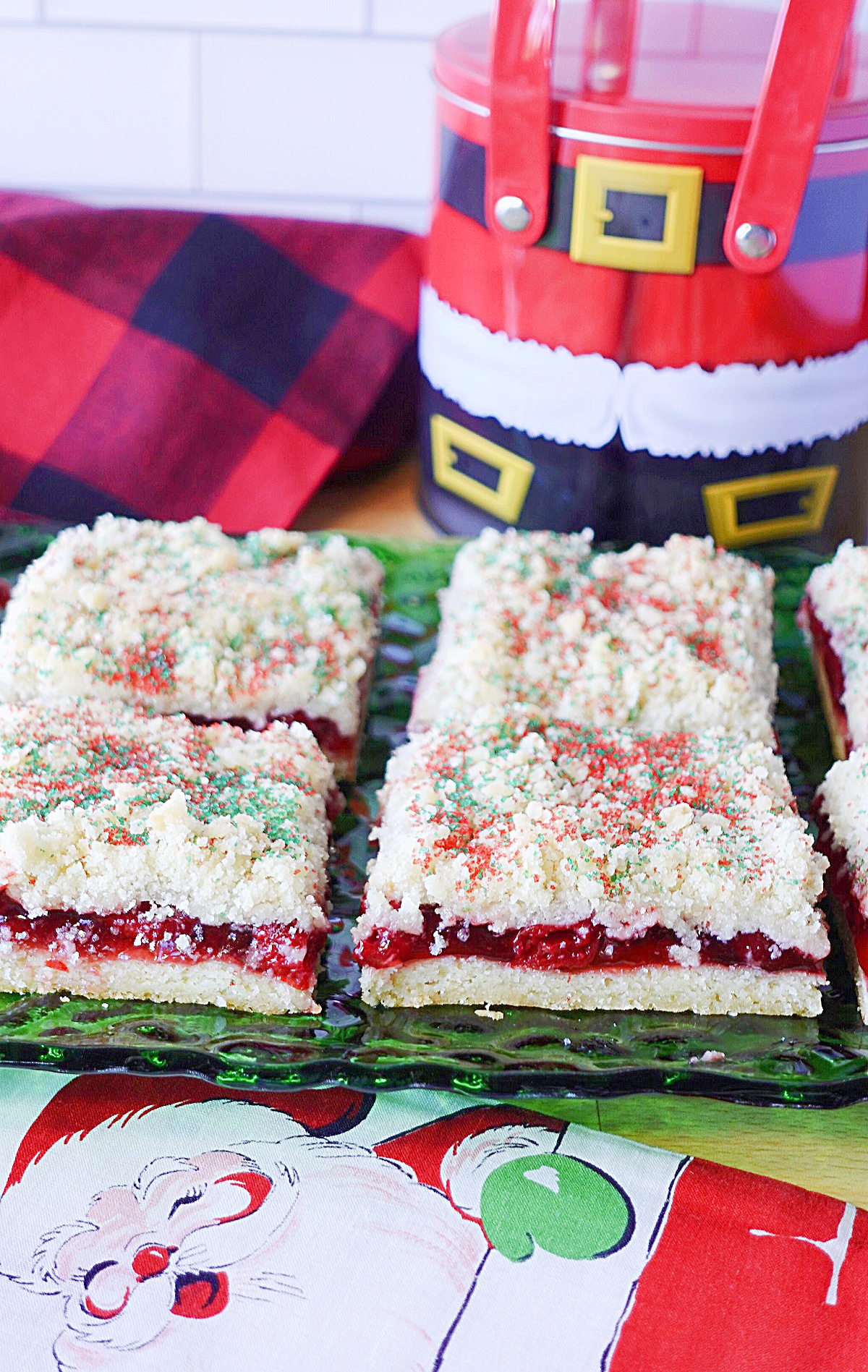 Layered Cherry Kuchen Bars with a cherry pie center.