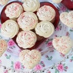 Almond Meringue Cookies on a glass plate.