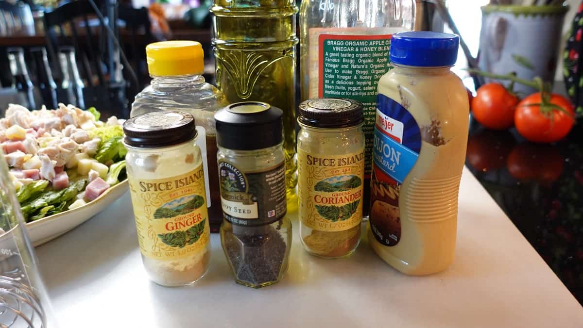 The ingredients for making a homemade Honey Dijon Vinaigrette.