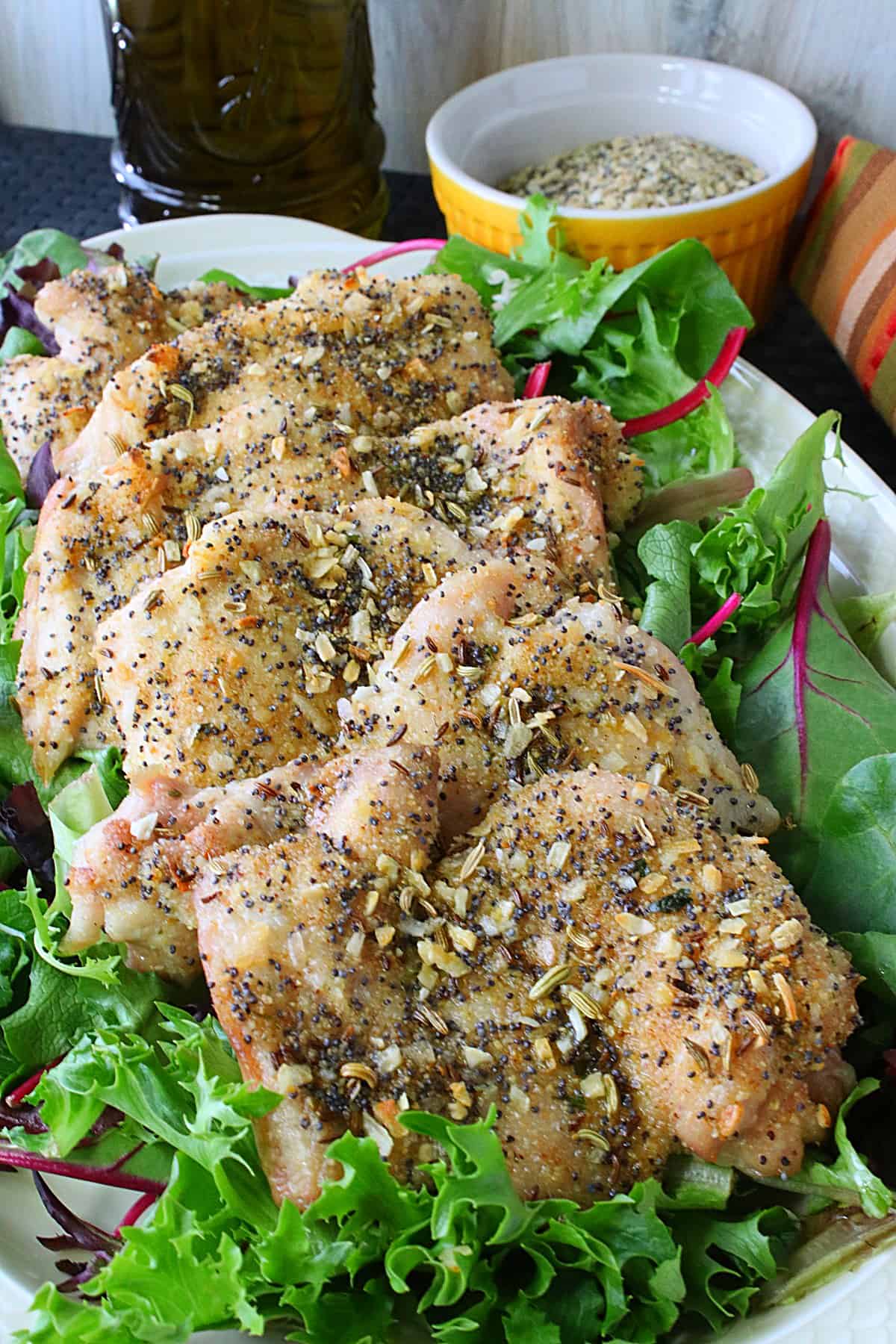 Baked Chicken Thighs with Everything Seasoning - Kudos Kitchen