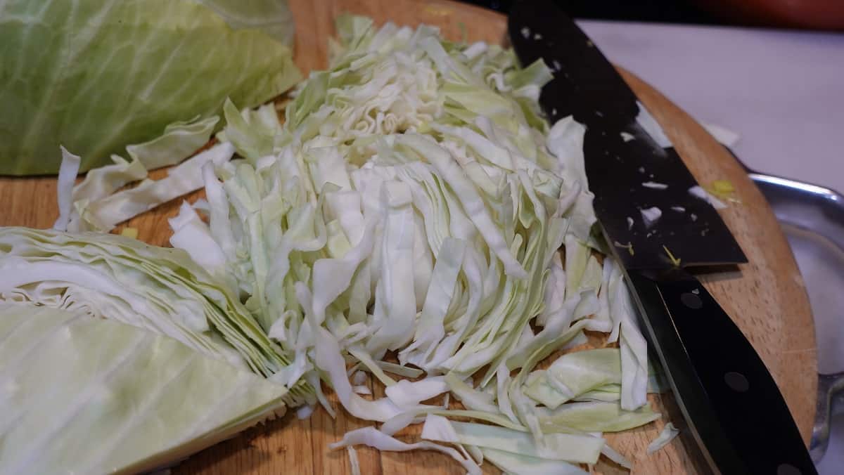 Image of how to slice and shred a cabbage.