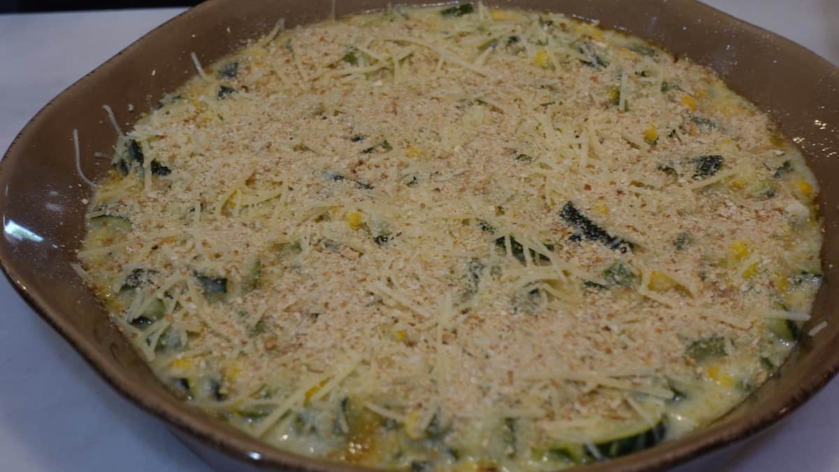 A vegetable casserole getting ready to go into the oven.