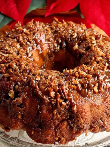 A delicious Coconut Caramel Crescent Ring on a glass platter.