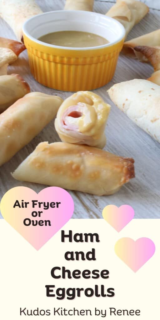 A Pinterest image with hearts for Ham and Cheese Eggrolls.