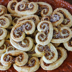 A plie of Pumpkin Spice Palmiers with sanding sugar on top.