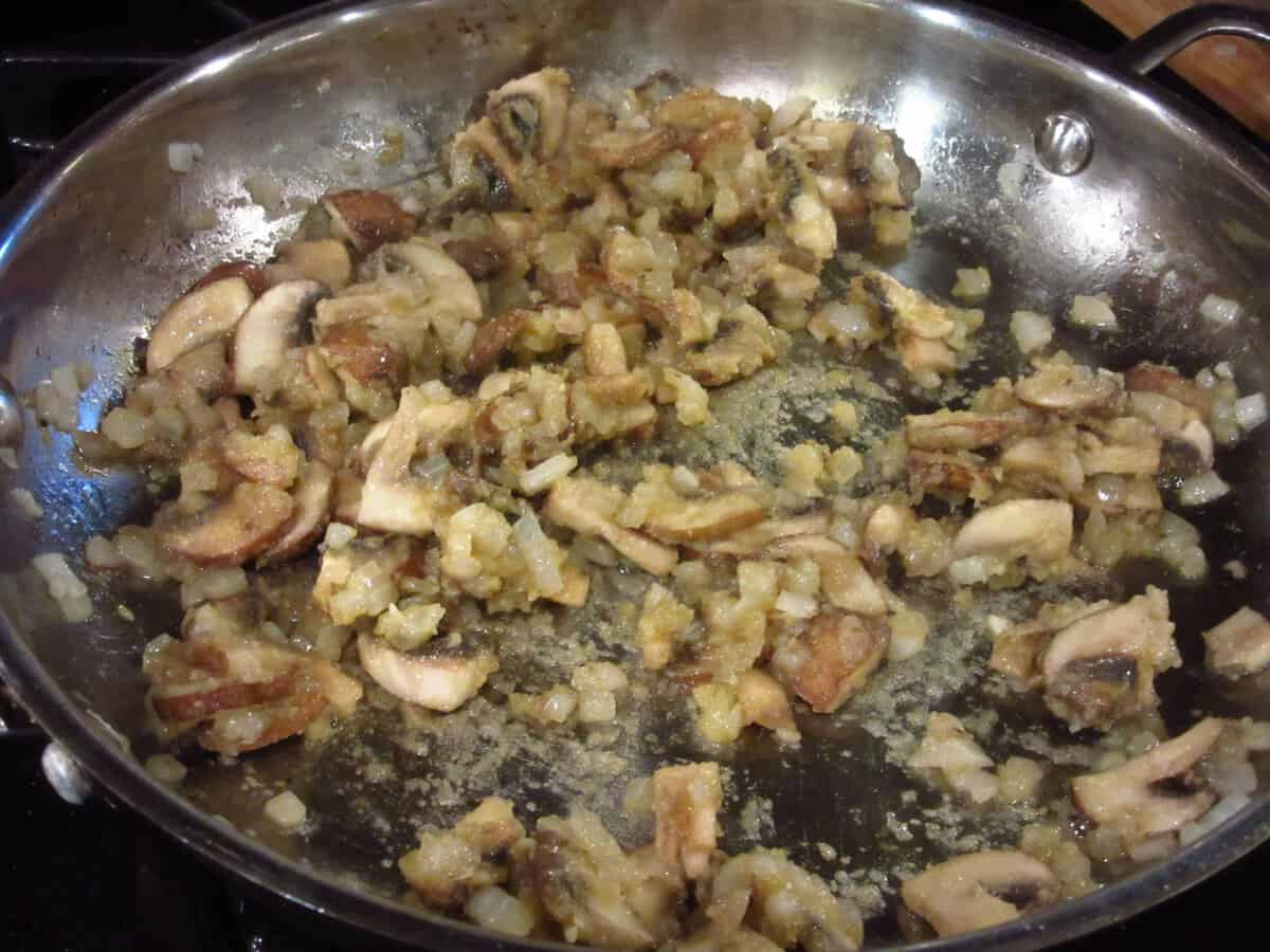 Mushrooms in a skillet to make gravy.