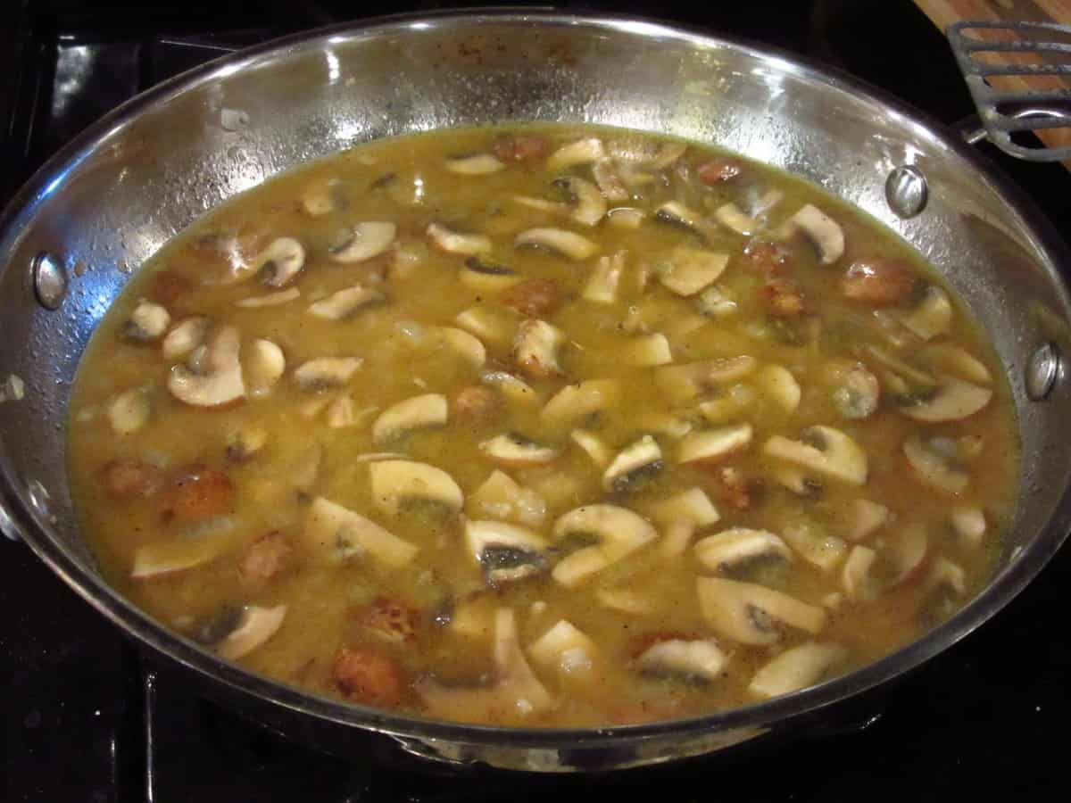 Mushroom gravy in a skillet.