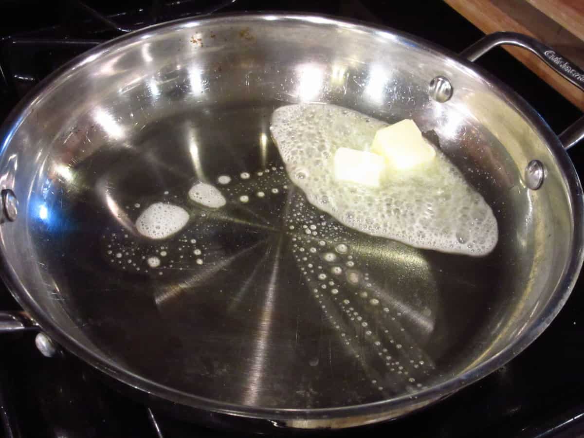 Melted butter in a skillet.