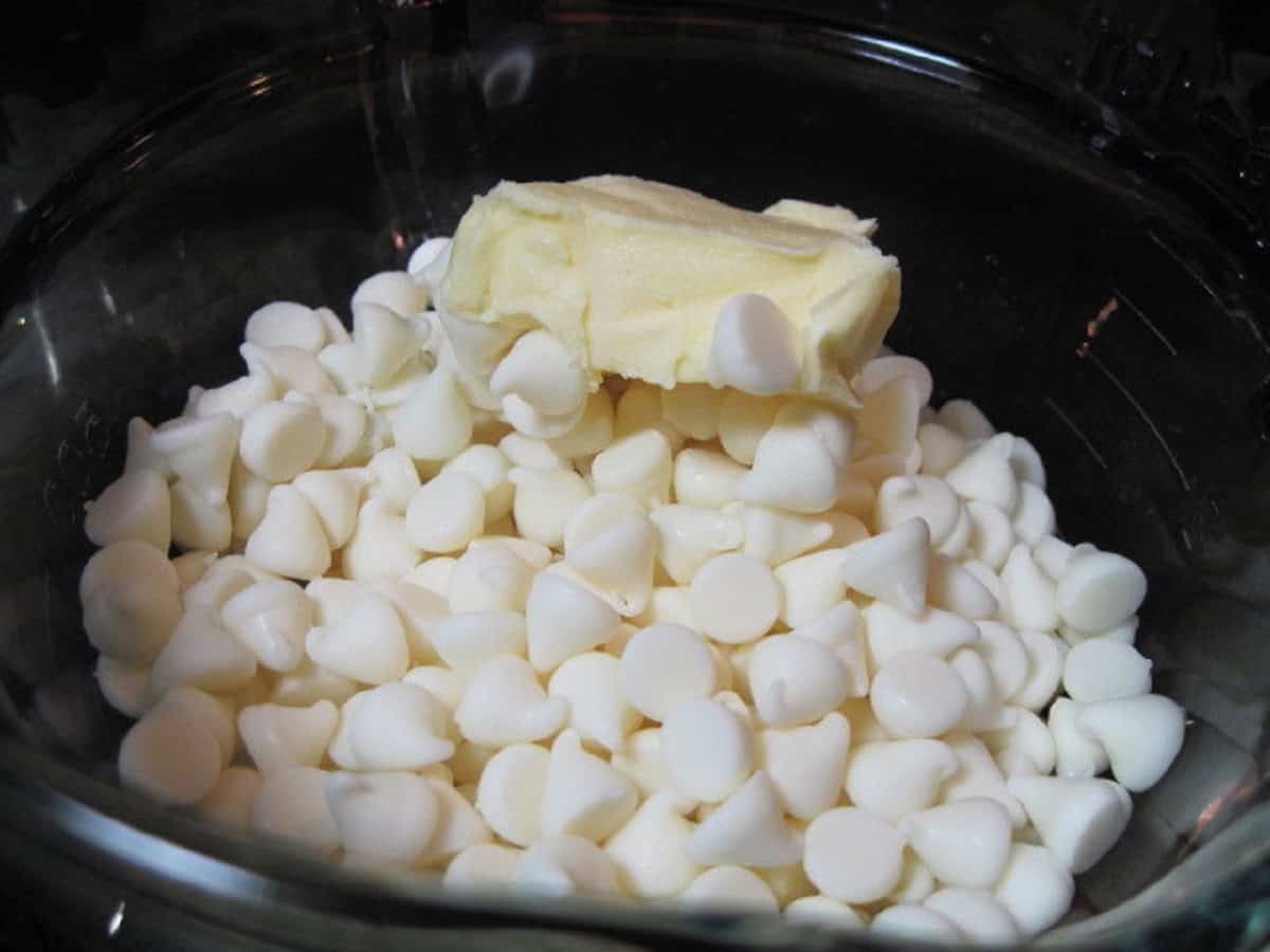 White chocolate chips in a glass bowl.