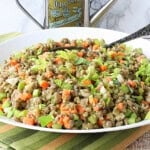 A white bowl filled with chilled French lentil Salad.
