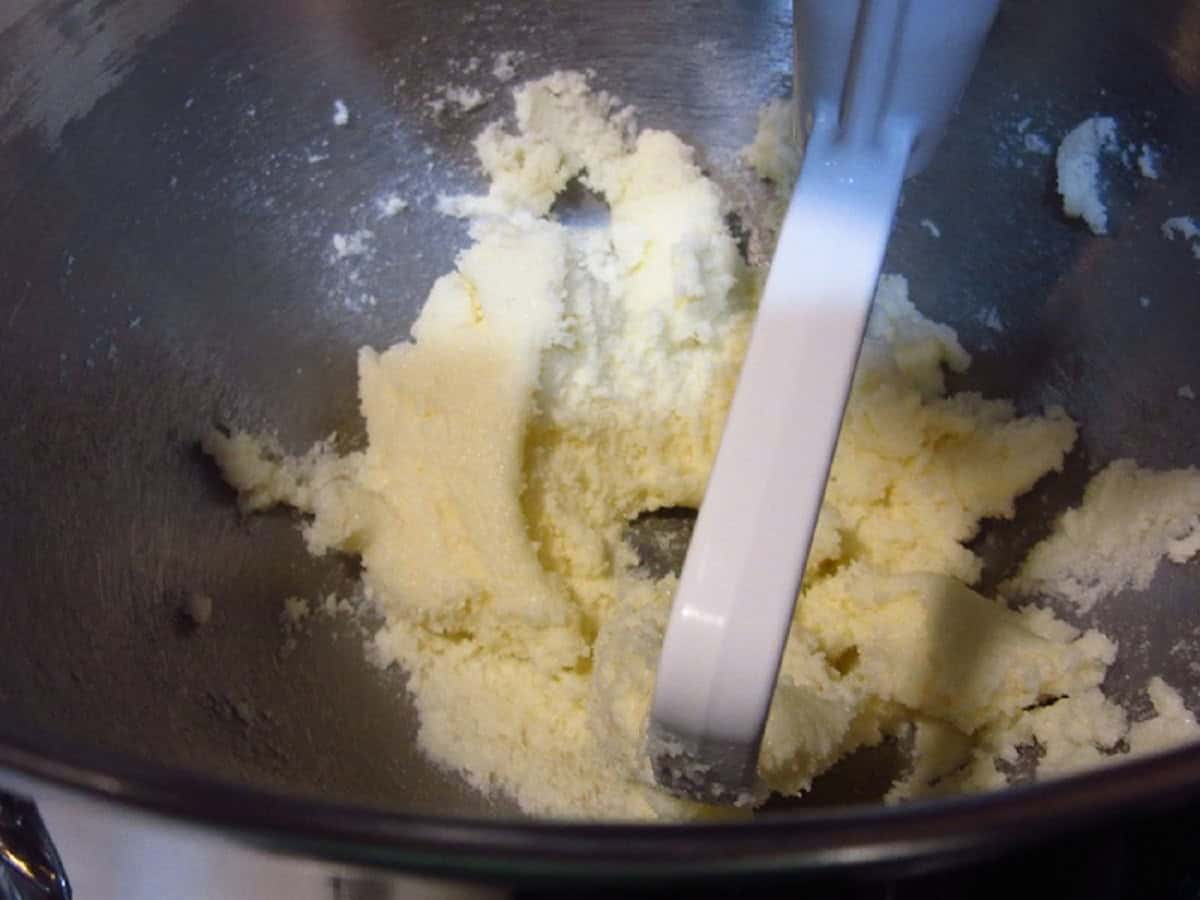 Creamed butter and sugar in the bowl of a stand mixer.