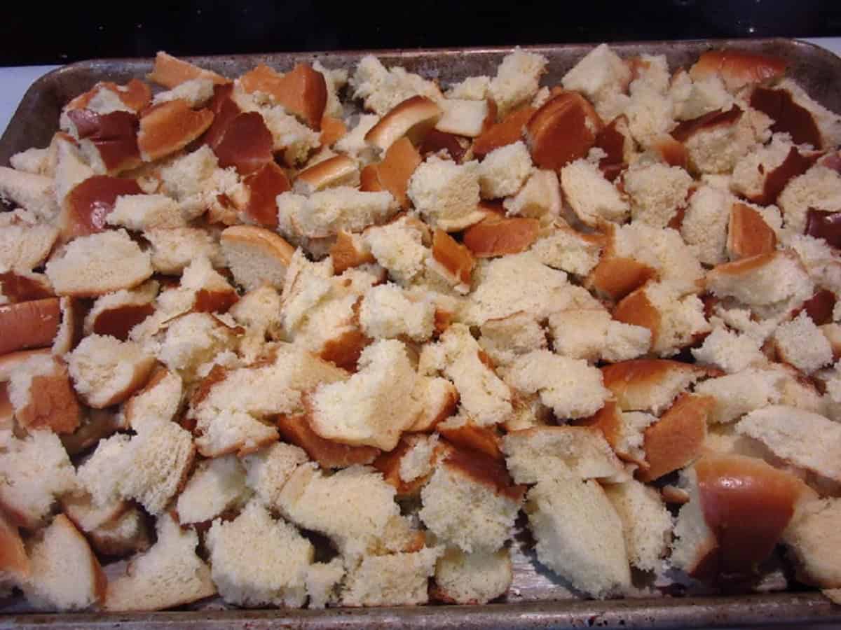 Bun pieces laid out on a baking sheet.