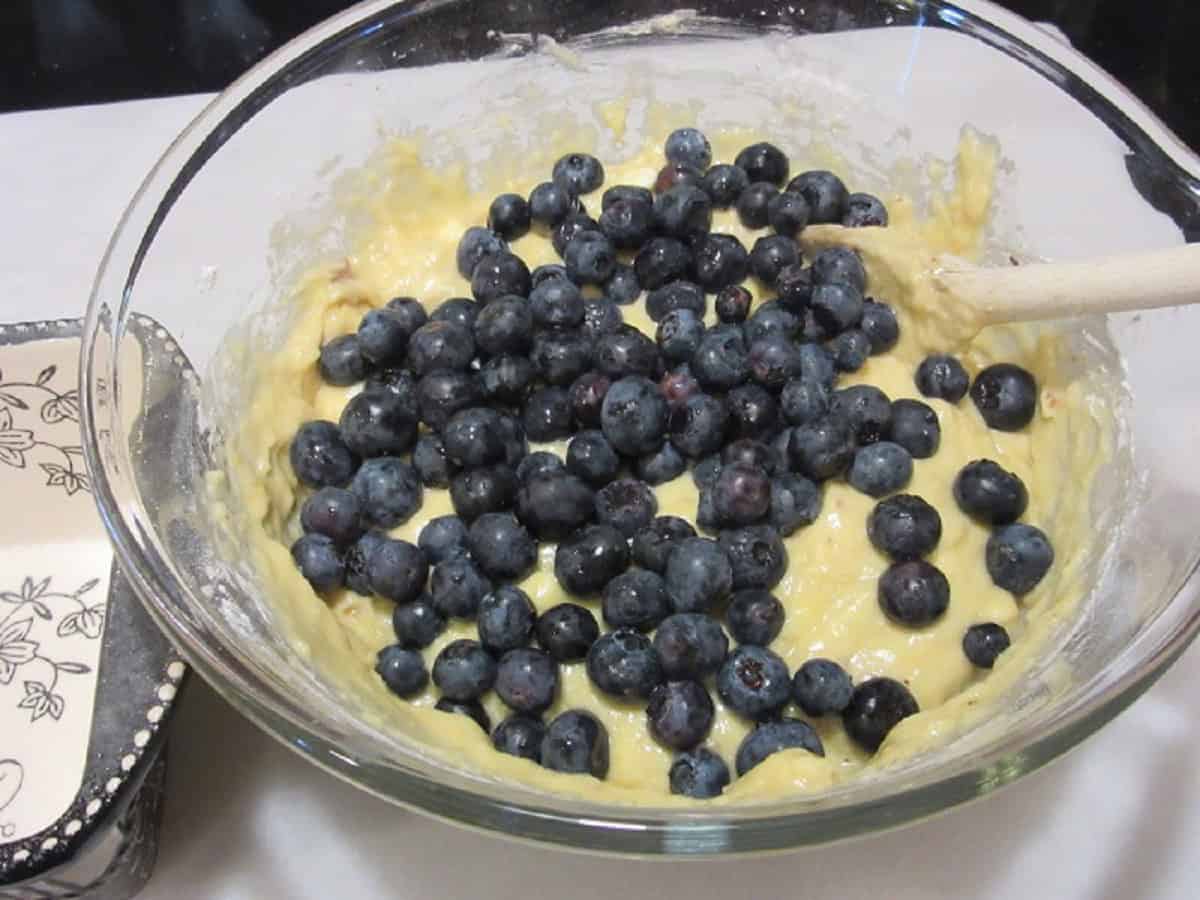 Fresh blueberries in a banana loaf batter.